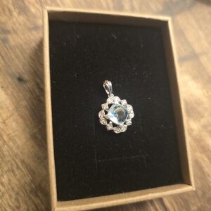 Elegant Silver Pendant with Blue Gemstone